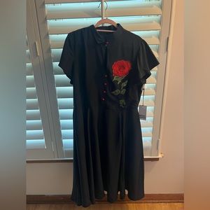 Cute rose keyhole dress. Never worn. Tags still on